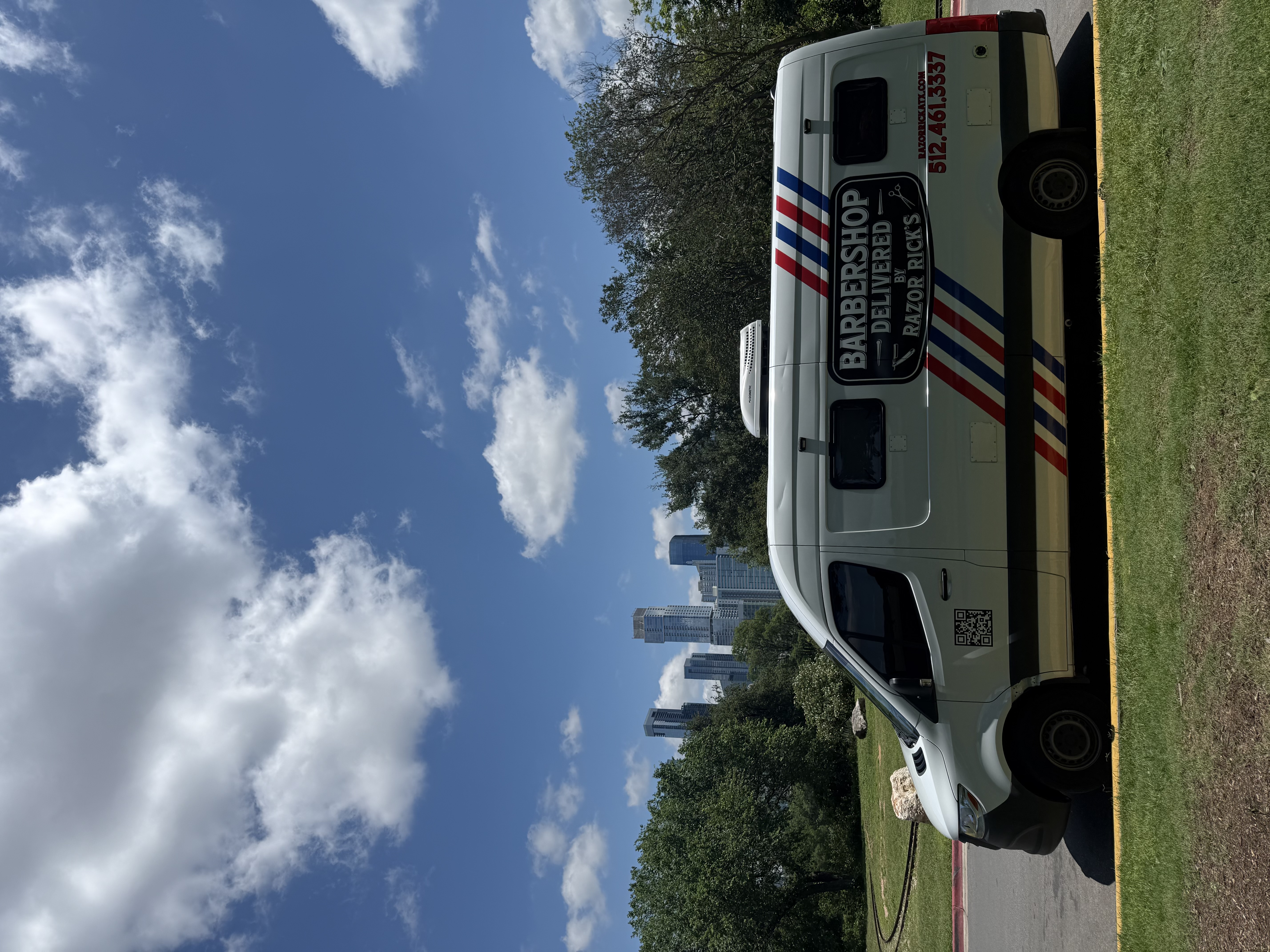 Razor Rick's branded mobile barbershop van — Austin TX